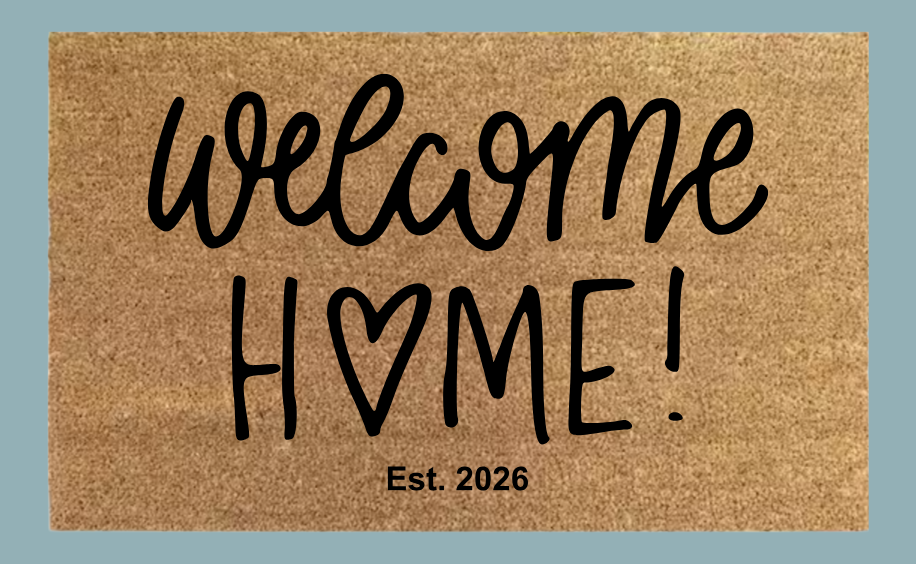 Welcome Home hand-lettered coir doormat by Sawyer Creative Co.